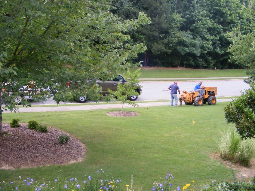 The cable men digging the trench